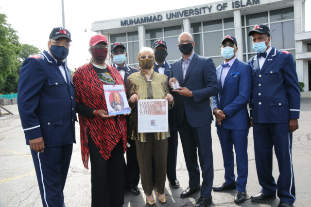 MUI graduates receive coin honoring Student Lt. Khalil Muhammad from Elite 50 Plus squad