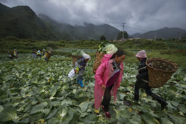 China uproots ethnic minority villages in anti-poverty fight