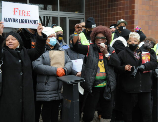 After terrifying police raid, Black women, men stand with Anjanette Young