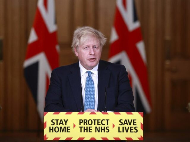 Questions on Covid-19 vaccine mount in UK as new strain spreads