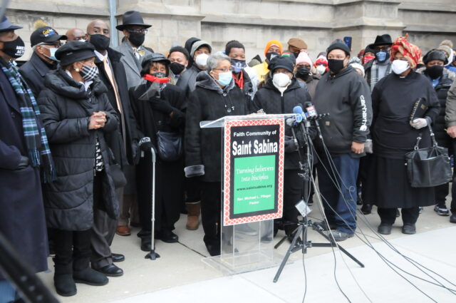 Supporters of Chicago’s Father Michael Pflfleger come to his defense