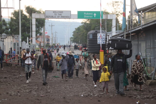 Thousands in path of erupting volcano in Congo flee to Rwanda