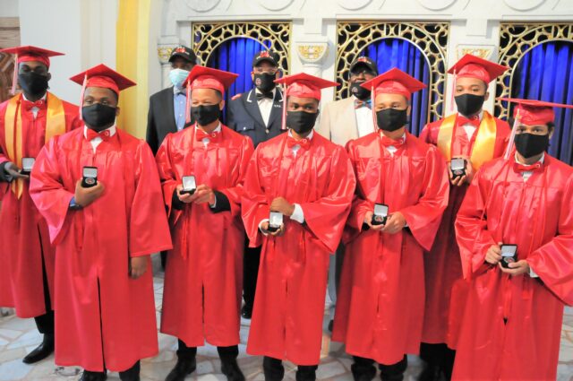 Elite 50 Plus honors graduates with commemorative coin
