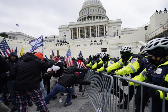 A Nation in Peril: One year since the insurrection, America continues its downward spiral