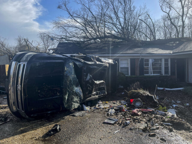 Tornadoes slam U.S. South, California cleans up