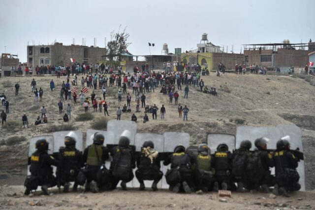 Peru police fire tear gas at protesters after president calls for ‘truce’