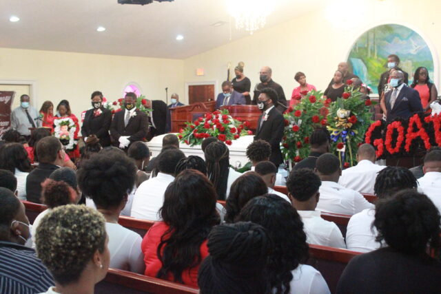 A community mourns a beloved son and faithful friend