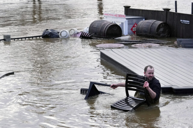 ‘God fights with the forces of nature’ Winter storm wreaks havoc in several states as California coast is hit with floods