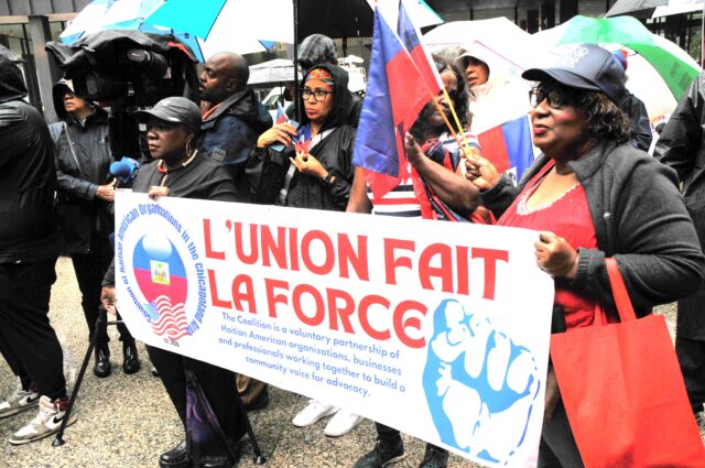 Haitians demand end to hatred and lies