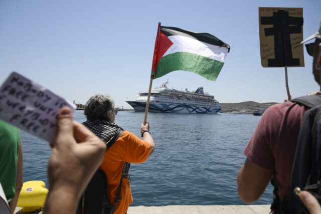 Pro-Palestinian protesters prevent Israeli cruise ship from docking in Greek island