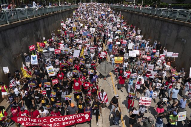 Thousands rally as D.C. federal takeover ends, but troops to remain