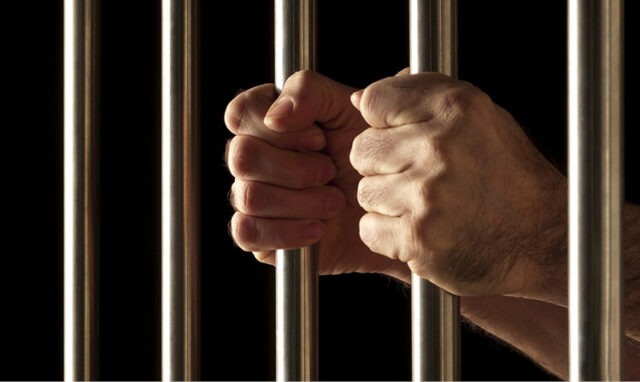 California social justice advocates call for independent oversight of sheriff’s department to address in-custody deaths A close-up of hands holding bars AI-generated content may be incorrect.