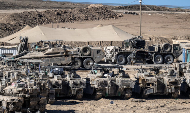 Trump ally seeks role in sprawling U.S. base project near Gaza A group of military vehicles parked in a dirt field AI-generated content may be incorrect.
