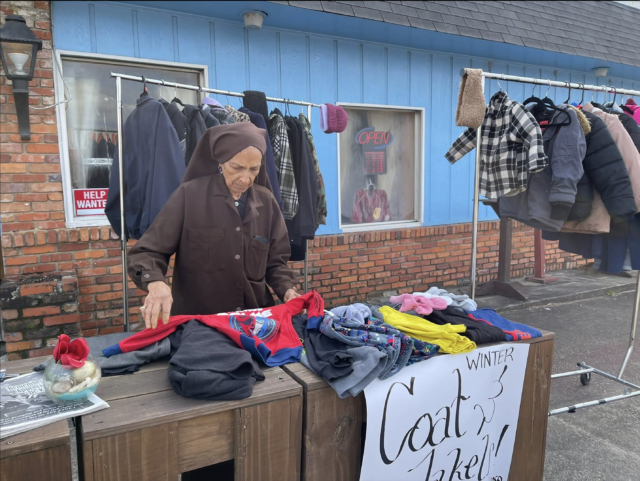 Muslim pioneer leads coat drive in Tuskegee, Alabama