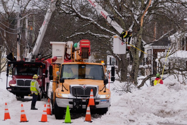 More snow falls on the Northeast U.S., where huge piles remain from the last storm