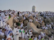 Muslim pilgrims converge on Mount Arafat in Saudi Arabia during Hajj