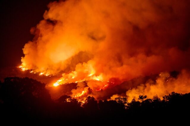 ‘It’s apocalyptic’: Western states burn amid dry conditions