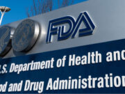 Is America’s food supply in jeopardy? A large sign outside a building displays the FDA logo and the text U.S. Department of Health and Human Services Food and Drug Administration. Description generated by AI